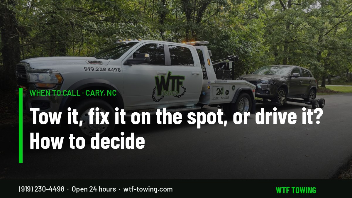WTF Towing wrecker towing an SUV — when to call a tow truck in Cary, NC