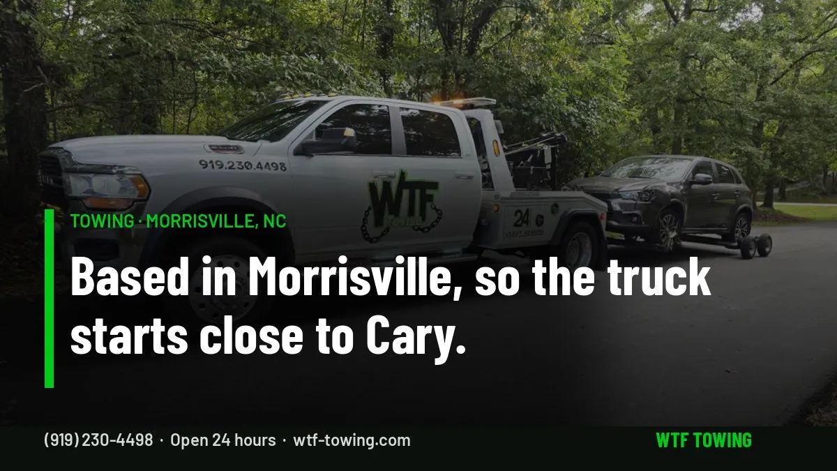 WTF Towing wrecker towing an SUV on a tree-lined road — towing in Morrisville, NC, based close to Cary, RTP and RDU