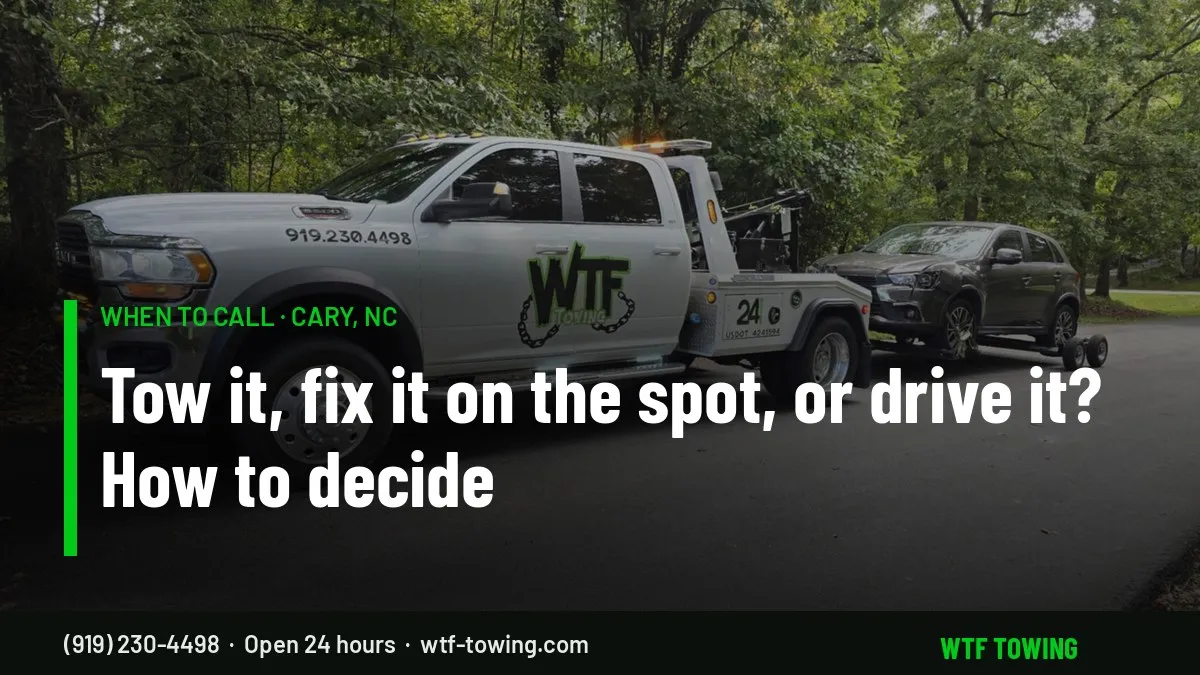 WTF Towing wrecker towing an SUV — when to call a tow truck in Cary, NC